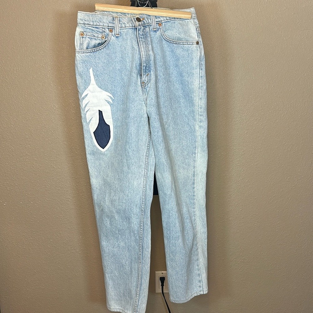 Light blue wash mom jean with Southwest embellishment